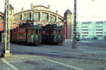Zwei Motorwagen der Serie Be 2/2 vor dem schönen Depot Wiesenplatz, 1972