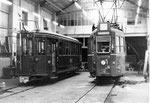 Der Trammotorwagen Be 4/4 Nr. 443 und ein Anhängewagen in der BVB-Werkstätte, 1969