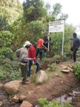 Demarcating Kihama Chini water source in Vudee village with villagers