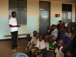 Field Officer (Paul Nyindo) giving speech during local campaign on International World AIDS Day 2011
