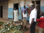 Illustration of how to measure wood poles for Kibuyu Chirizi installation in Ngulu Primary School