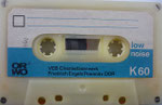 ORWO Kassette K60 transparent / Fenster schmal / Aufkleber hellblau ORWO Logo schwarz links oben / mit low noise