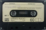 Kassette ORWO Fe I K60 (Dessau) / Gehäuse schwarz /Fenster groß / 4 fach Verschraubung / 4 zeiliger Aufdruck