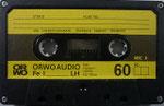 Kassette ORWO Fe I K60 (Premnitz) / Gehäuse schwarz Fenster groß / 4 fach Verschraubung 3 zeiliger Aufdruck