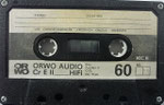 Kassette ORWO CrExtra II K60 (Premnitz) / Gehäuse schwarz Oberfläche glatt / 4-fach Verschraubung / 3 zeiliger Aufdruck