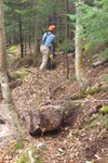 Fred winches a rock across the slope while a belay line keeps it from rolling out of control