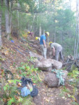 Stones are brought to the trail as the crew sets up to build a staircase