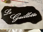 Plaque de maison : Le charbon extrait de la mine 