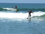 Surfers in Máncora