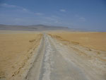 Driving through the desert in near Pisco on a road made out of salt