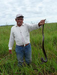 Our guide Negro with an anaconda in his hand