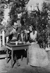 on the set of 'High, Wide And Handsome' with director Rouben Mamoulian