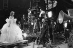 during filming, director Rouben Mamoulian on the right