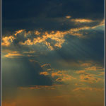 Sun behind Clouds