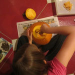 Me carving my pumpkin :)