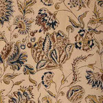 Fleurs brunes, indigo et jaune de Naples, imprimées sur un tissu écru, la couleur naturelle du coton.
