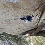 Chrissi dynoing out of the crux.