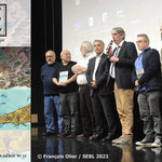 Jean-Paul Alayse, Claude Péron, Armel Morgant, Réza Salami, Brieg Haslé-Le Gall, Gilles Cardinal et les petits-enfants de Jim-E. Sévellec © François Olier / SEBL 2023