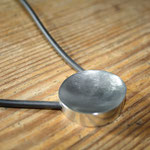Zilver (hol) met rubber koord