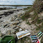 A plein air watercolor painting on the shore of Papa Westray