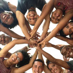 Teachers of 'Salsabor a Cuba' in a circle