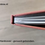 de rug van een genaaid gebonden boek