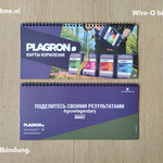 brochure met aan de bovenzijde een zwarte spiraal binding
