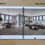 vlak liggende brochure door de spiraal binding