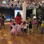 An impromptu disco at the Clore Ballroom. Madame Lark dances with some of the children - IMAGINE Children's Festival 2014 London