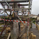 Avant : Restauration d'un muret et calvaire en pierre d' Euville et restitution à neuf de la croix sculptée.