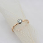Verlobungsring Rotgold 750 mit in Weissgold 750 gefasstem Brillant 0.2ct, 935.-