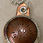 XO locket.