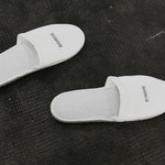  "Breath /Ritmico dispersivo)", 2019, rubber stamping on fabric slippers, four pairs, ph. Luca Scarabelli