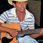 Valter is a real Pantaneiro and employee of Pousada Rio Claro, here singing local country music