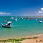 Ocean view with fishing boats at Praia do Forte
