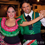 Juliano Espindola and Makarena Chamorro in mexican costumes during dance show Churrascaria Rafain, Foz do Iguacu, Brazil
