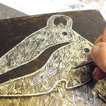 Scratching wax off metal plate 2