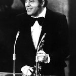 Philip D'Antoni receiving the Best Picture Oscar during the Academy Award Ceremonies, 1971