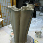 A bouquet form in progress -- the base is made of tubes