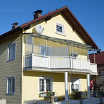 Balkonüberdachung aus Edelstahl mit Glas (© Raven Metall Design)