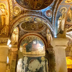 dark church in Göreme is a cave in the tuff rocks as well