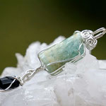Aquamarin und schwarzer Turmalin auf Sterlingsilber, 81 x 18 x 14mm, beidseitig zu tragen     €138    Art.Nr.: 25050013 
