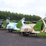 Vespas beneath a ricefield near the beach