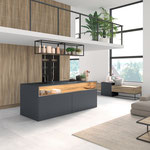 Cuisine en bois et laque anthracite. Plans de travail en pierre noire. Cuisine avec ilot central. Cuisine ouverte. Cuisine tendance. Cuisine sans poignée. Cuisine moderne et tendance 2024. Cuisine haut de gamme. Cuisin Design Toulouse
