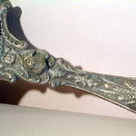 Bugia in argento lavorato con angelo, bottega italiana sec. XIX