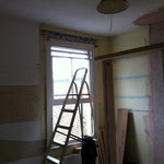 before - odd layout of bed & cupboards meant there was no clear floorspace making it feel oppressive & cramped