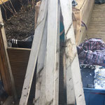 before - reclaimed fence posts