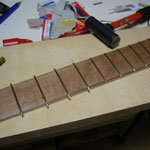 Fretboard job. Freting, sanding the side edge roughly, add side-dot mark then sanding and clean-up the side edge once.