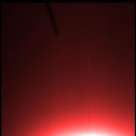 Abb. 14: Original-Filteraufnahme vom 26. Januar 2003 um 07:09:59 UT. Die Jupiterringe sind als leichter senkrechten Strich zu erkennen. Oben links befindet sich ein schwarzer Arm oder Antenne von Galileo. © NASA/SETI Insitute (OPUS)