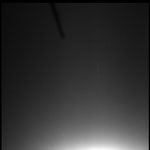 Abb. 15: Original-Filteraufnahme vom 26. Januar 2003 um 07:25:28 UT. Die Jupiterringe sind als leichter senkrechten Strich zu erkennen. Oben links befindet sich ein schwarzer Arm oder Antenne von Galileo. © NASA/SETI Insitute (OPUS)